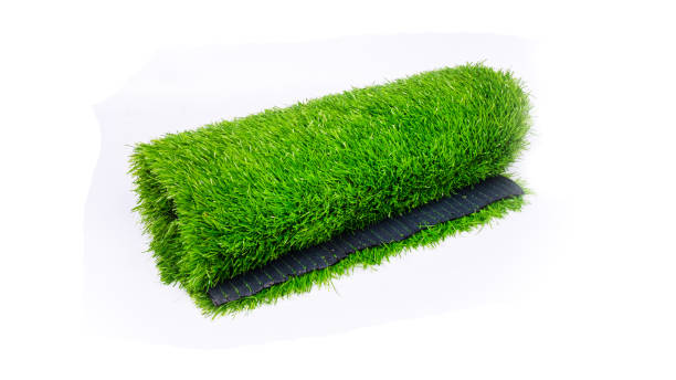 istock roll of plastic turf for sports grounds isolate on white background 1310261083