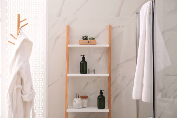 istock Plants and different toiletries on decorative ladder in bathroom. Interior design 1310263635