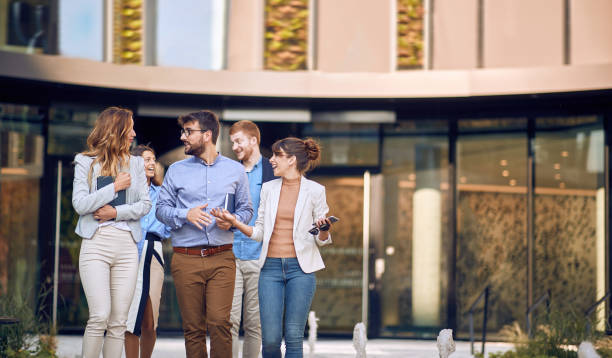 istock Large group of young businesspeople walking 1310267535
