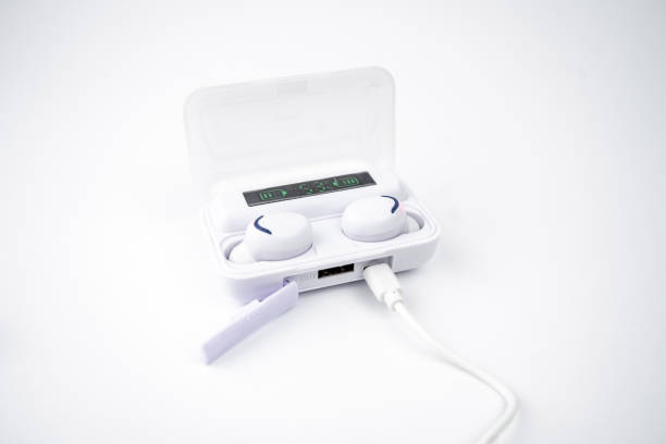 istock white true wireless earbuds with digital display in plastic charging box, isolated on white background 1310269852