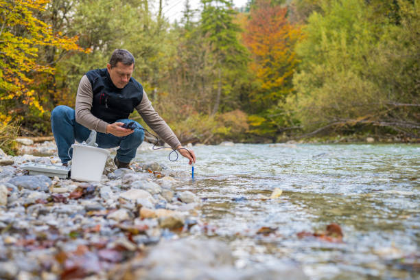 istock Male biologist testing the oxygen levels in the river 1310269862