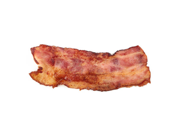 istock Crispy strip of bacon isolated on white background. 1310270040