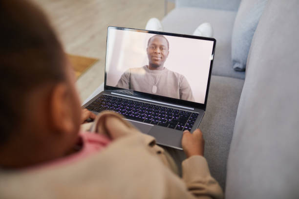 istock Girl Talking by Video Chat with Father 1310274219