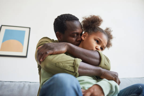 istock Caring African American Father Embracing Daughter 1310274229
