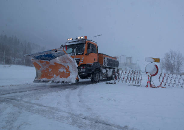 istock snow plow on country road 1310280889