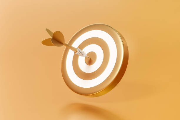 Golden arrow aim to dartboard target or goal of success on business background with complete achievement concept. 3D rendering. Golden arrow aim to dartboard target or goal of success on business background with complete achievement concept. 3D rendering. dartboard bulls eye darts dart stock pictures, royalty-free photos & images