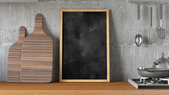 Blank Chalk Board on Kitchen Counter. 3d render
