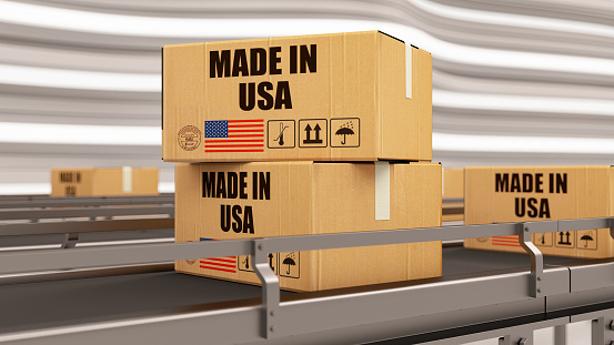 Made in USA United States. Cardboard Boxes on Conveyor Belt. 3d render