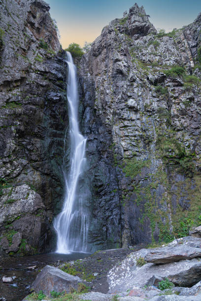 istock Gweleti waterfall flows among the stones 1310285282