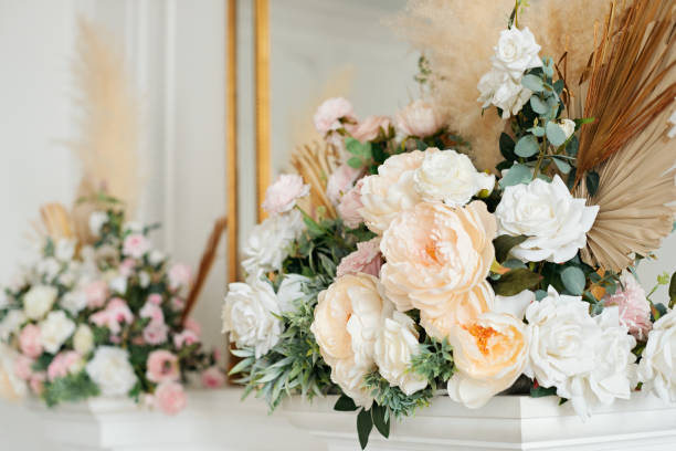 istock Wedding decorations with flowers. Beautiful flower composition in classic interior. Decoration of a banquet at a wedding with flowers. 1310285304