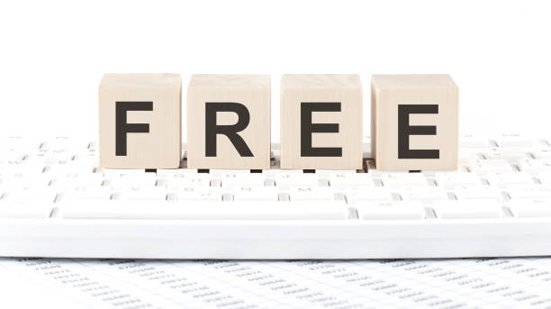 istock FREE -word wooden block on keyboard background witn chart 1310290323