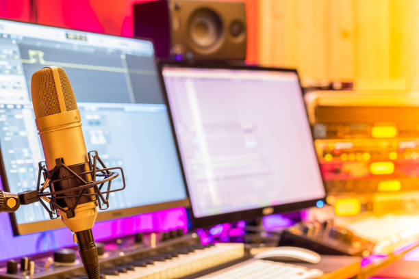 condenser microphone in studio for online meeting, post production, music production concept condenser microphone in studio for online meeting, post production, music production concept post production house stock pictures, royalty-free photos & images