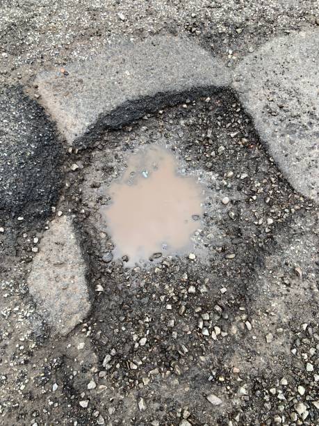 istock Pothole on Asphalt Street 1310294552
