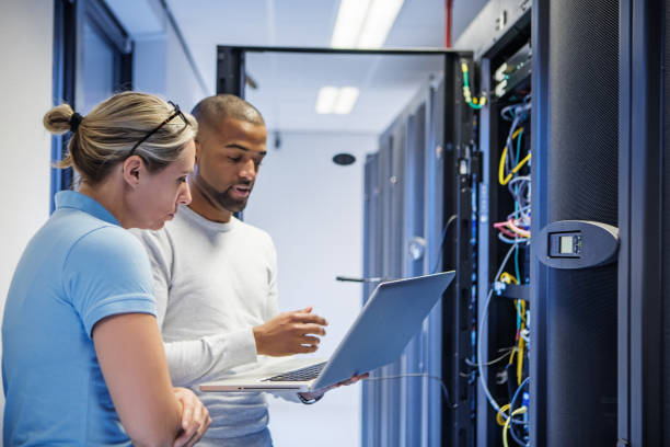 istock A duo of server room technicians at business reopening 1310295634