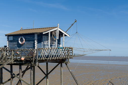 The fishing huts on stilts are called 'Carrelet' on the Gironde estuary, in the Médoc