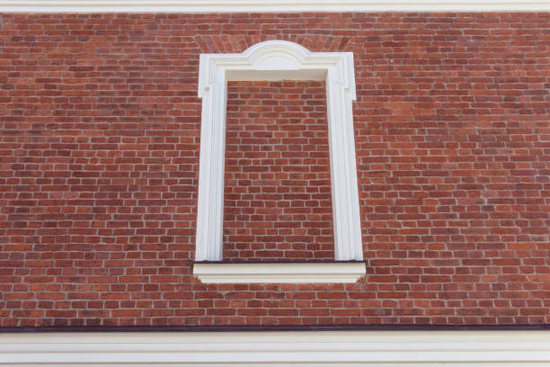 the facade of the windows of the old building, ancient architecture, arched windows. High quality photo