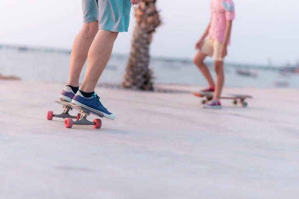 istock People skating, surfing, exercising and resting 1310302129