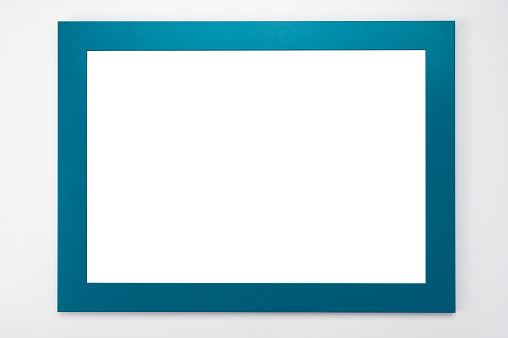 Horizontal Frame Mockup. Isolated on white background. White poster with cyan frame mockup. Man hands hold blue frame. hanging frame mockup on white wall. Picture border mockup.