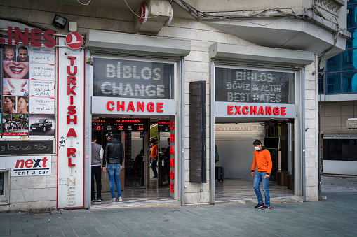 Istanbul,Turkey- April 01,2021:Exchange Office in İstiklal Street.Man changes currency at money changer shop