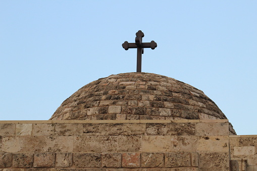 CHURCH DOME WITH CROSS ON TOP IN BEIRUT CENTRAL DISTRICT.