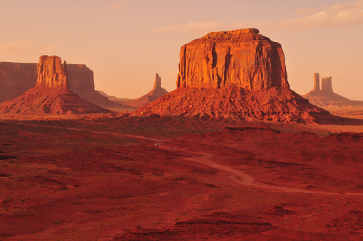 Late afternoon light bathing the buttes and mesas of Monument Valley, Utah - Arizona border