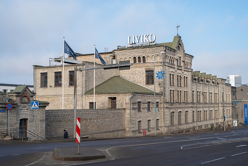 Tallinn, Estonia - March 26 2021: Liviko alcohol factory at early spring morning. Liviko is the largest alcohol producer in Estonia and leading premium alcohol group in Baltic states.