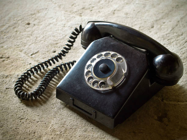 istock Vintage landline telephone with a coiled cable 1310312150