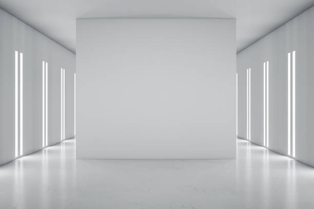 istock Blank grey partition in the center on modern empty hall with glossy floor and led lights on walls. 3D rendering, mockup 1310315754
