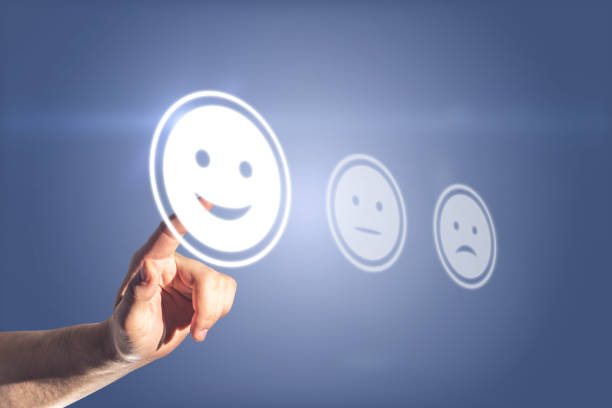 istock Service evaluation concept with man finger joyful smile in digital touch screen 1310315763