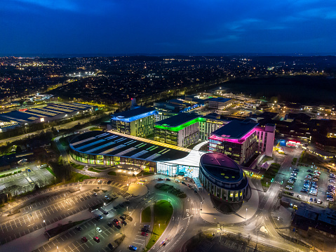 Mansfield Sutton In Ashfield 30.3.2021 Modern big NHS Kings Mill hospital building lit up bright colourful night illuminated exterior aerial view drone photography blue hour beautiful stunning colours