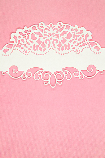 Floral frame on pink paper background