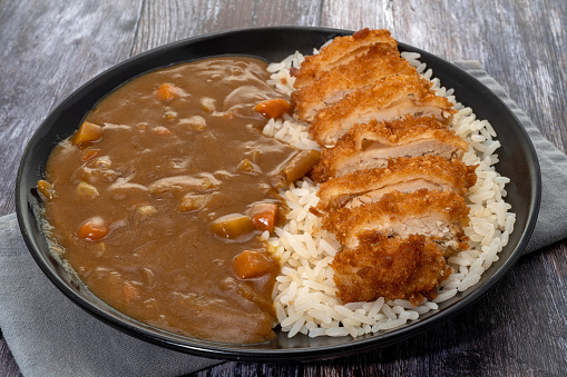Plate of chicken katsu curry with white rice
