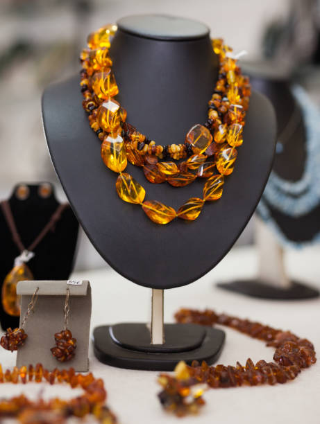 istock Counter with amber jewelry in store 1310320612