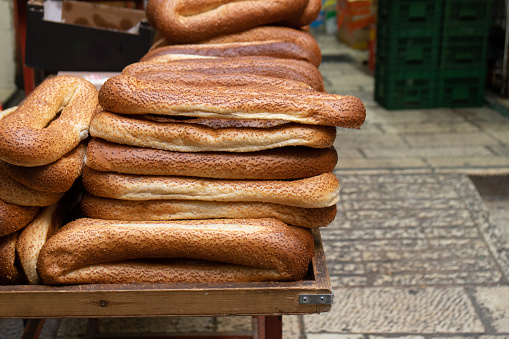 A lot of traditional arabian bread bagele on the street counter in old Jerusalem, Israel