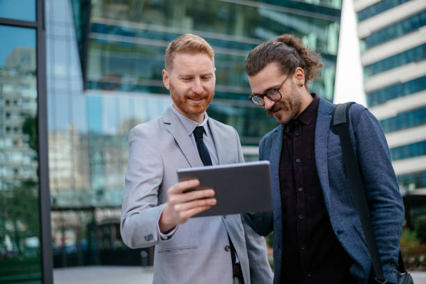 istock Business people discussing article stock photo 1310323746