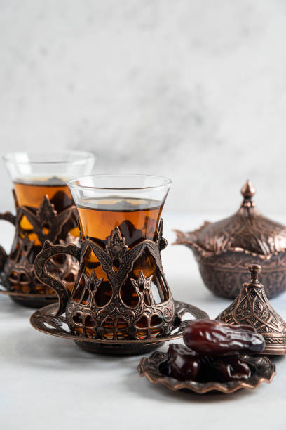 istock Close up photo Fragrant tea and dry date 1310324475