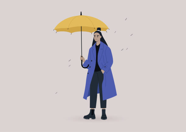 eine junge asiatische figur trägt einen übergroßen mantel und hält einen gelben regenschirm, ein regnerisches wetterkonzept - parasol umbrella asian ethnicity asian culture stock-grafiken, -clipart, -cartoons und -symbole