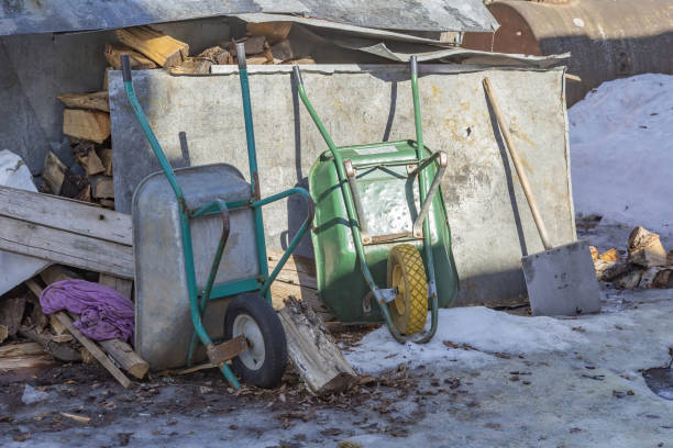 istock Two old hand household wheel barrows in the backyard 1310329038