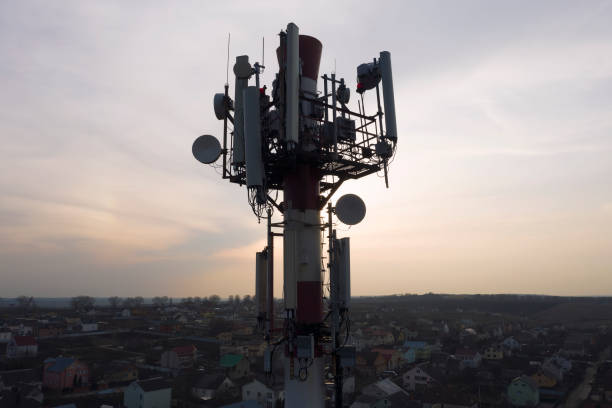 istock Telecommunication tower of 4G and 5G cellular. Base Station or Base Transceiver Station. Wireless Communication Antenna Transmitter. Telecommunication tower with antennas against blue sky. 1310329487