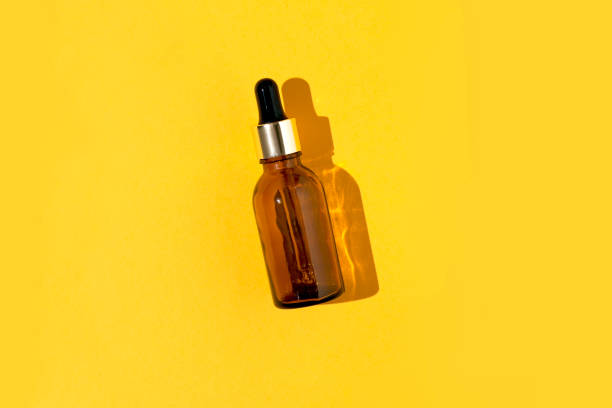istock Glass dropper bottle organic skincare minimal pattern 1310331511