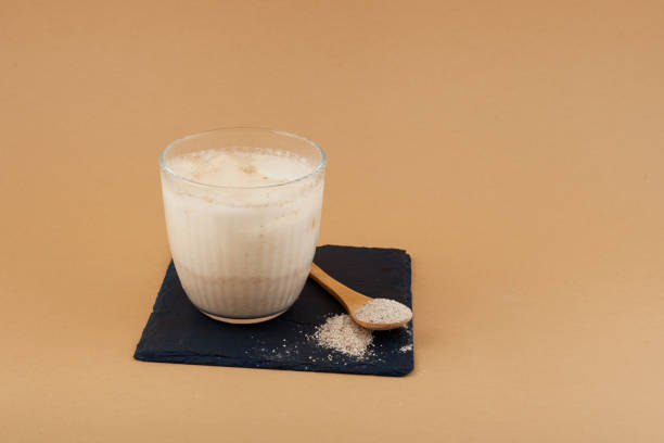 istock Misutgaru Latte - Korean refreshing drink on beige background with copy space. Popular breakfast drink. Healthy Protein smoothie 1310333439