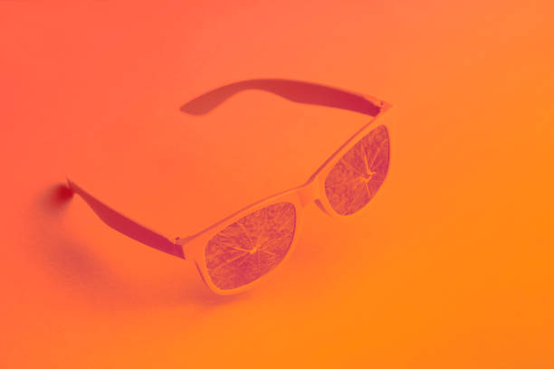 istock Beach sunglasses summer concept on pink background 1310336744