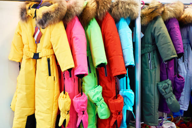 istock Winter kids ski suits in the store 1310337520
