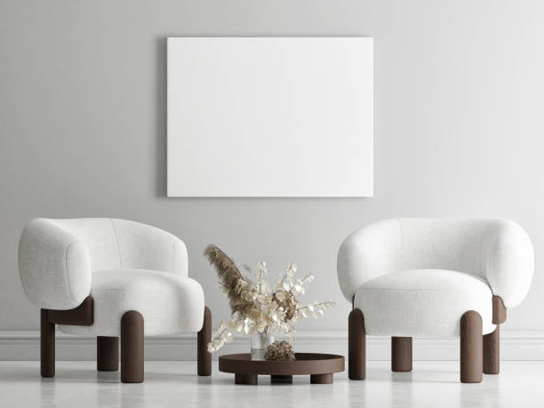 istock The empty frame on the wall, Minimalism interior composition armchair, table, and plant decoration. 1310339806