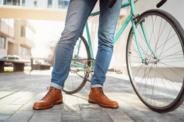 istock Front view of an unrecognizable stylish man with a bicycle 1310340872