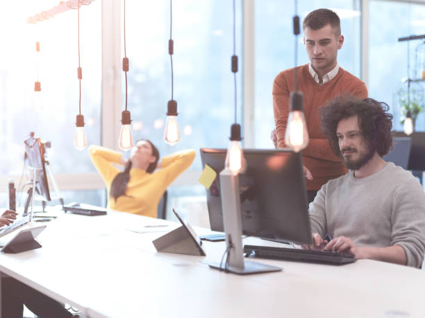 istock creative business people team as freelancers in modern coworking open space office 1310341494