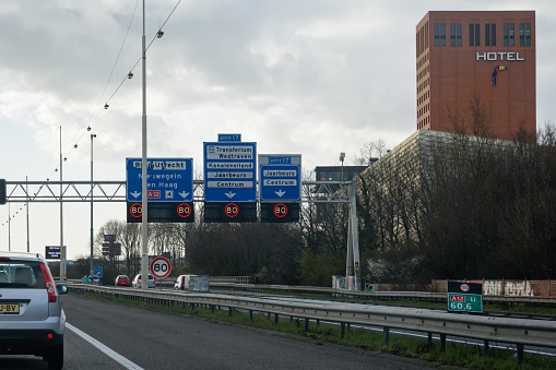 Utrecht, province Utrecht, Netherlands, march 27th 2021, traffic on the dutch highway A12 in Utrecht at exit 17 to the \