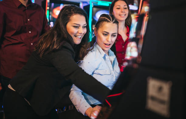 istock People gambling on slot machines 1310346855