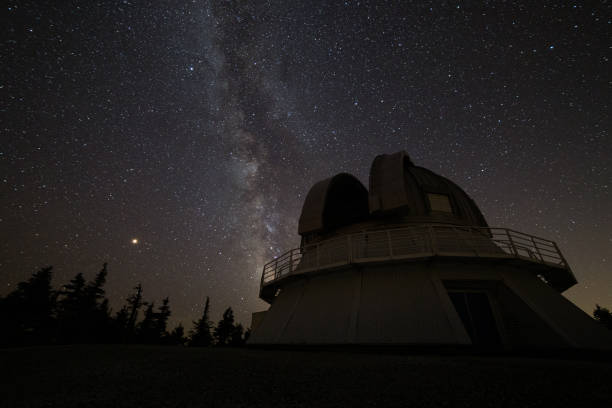 istock observatory ni the dark with stars behind 1310346942