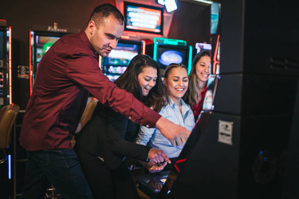 istock People gambling on slot machines 1310347050